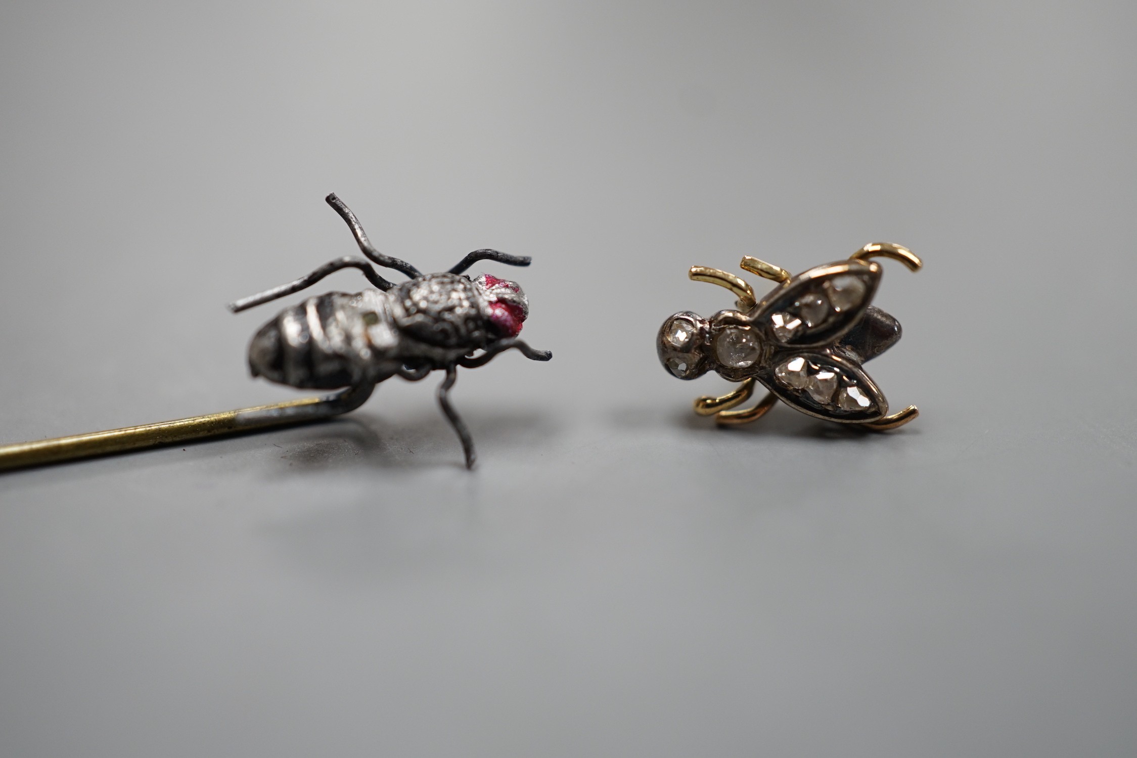 A 19th century yellow metal and rose cut diamond set 'fly' stud, 8mm and a bug stick pin.